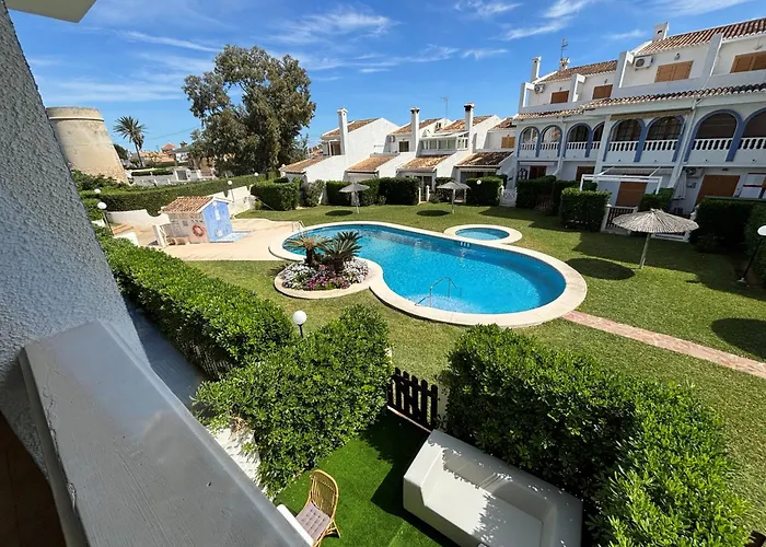 Апартаменты Torre Almadrava Primera Linea Serviden